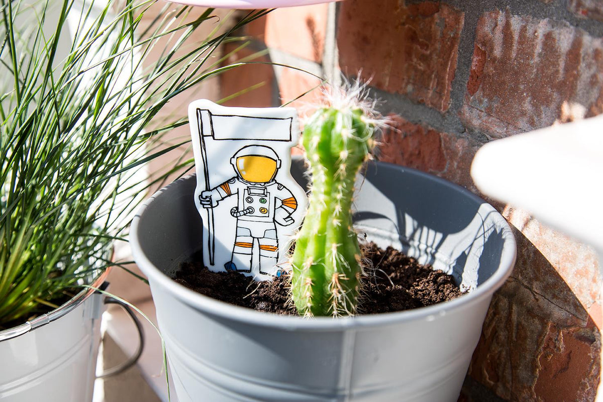 Blumentopf-Etikett Astronaut