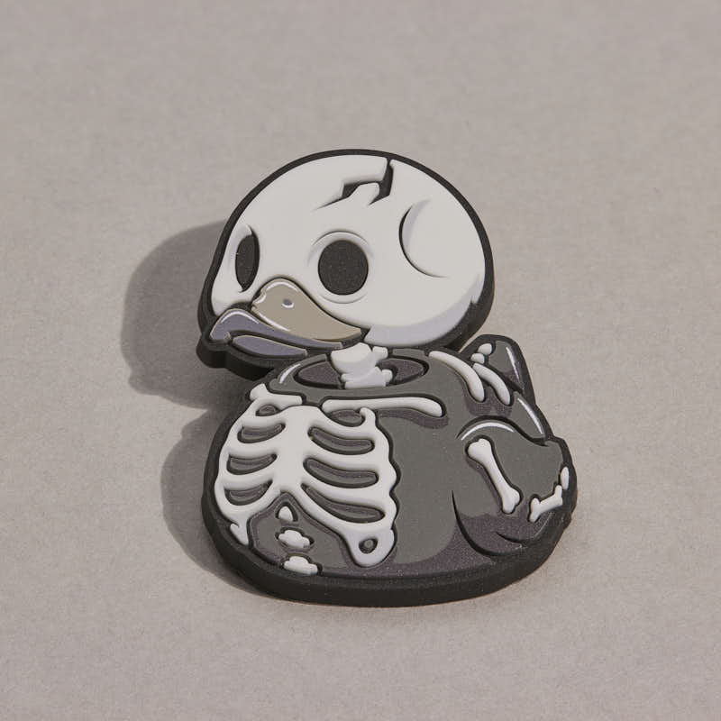 Pin's TUBBZ Numskull – Squelette phosphorescent – visuel 5
